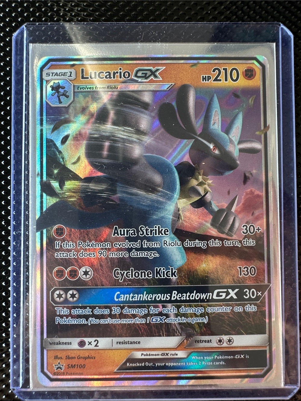 Pokemon Lucario-GX Holofoil Card - Blue, Black, Orange LP